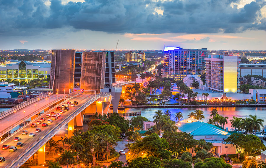 Explore the best of fort lauderdale with luxury vacation stays 1 Colorful night skyline of downtown fort lauderdale with drawbridges up and cloudy evening
